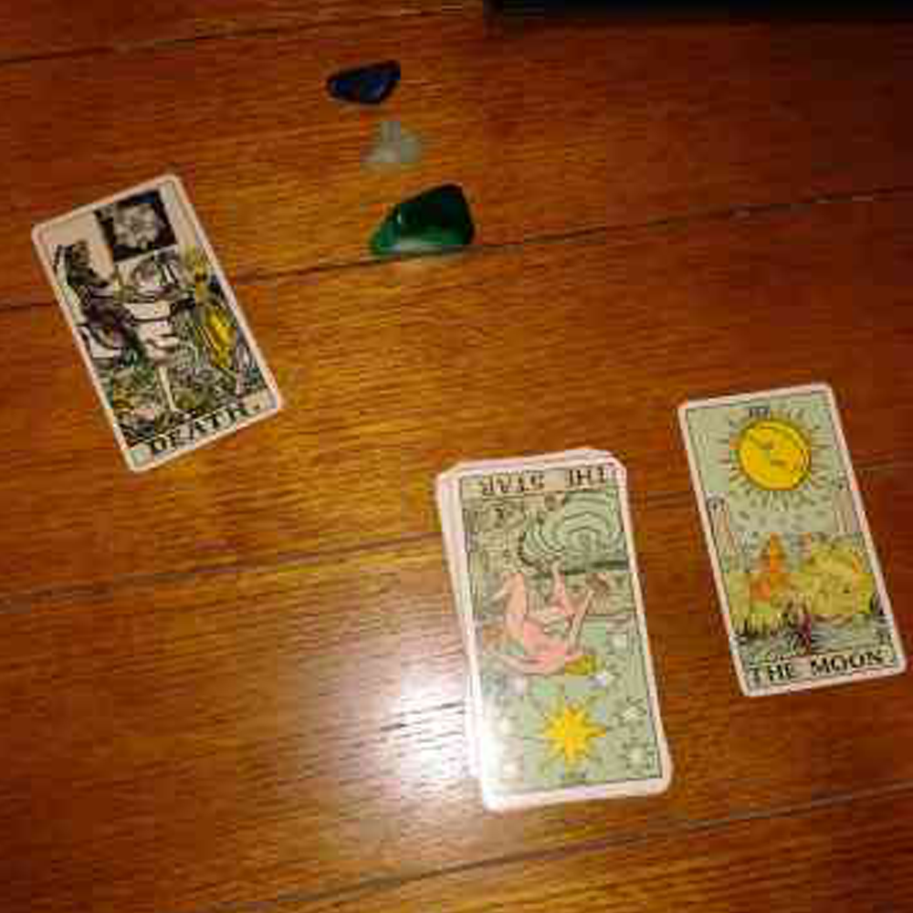 tarot cards on a wooden table